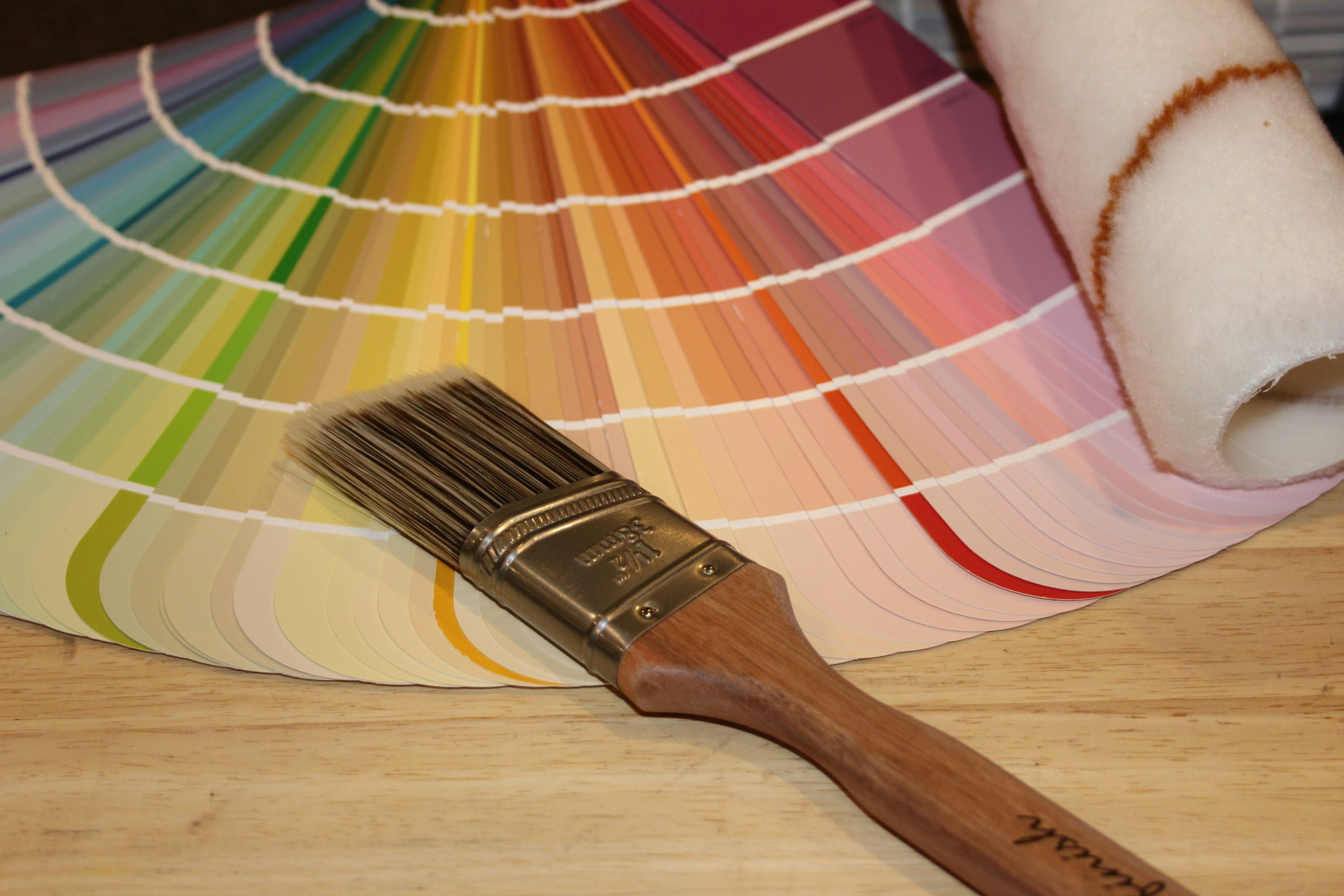 color swatch fan and paintbrush